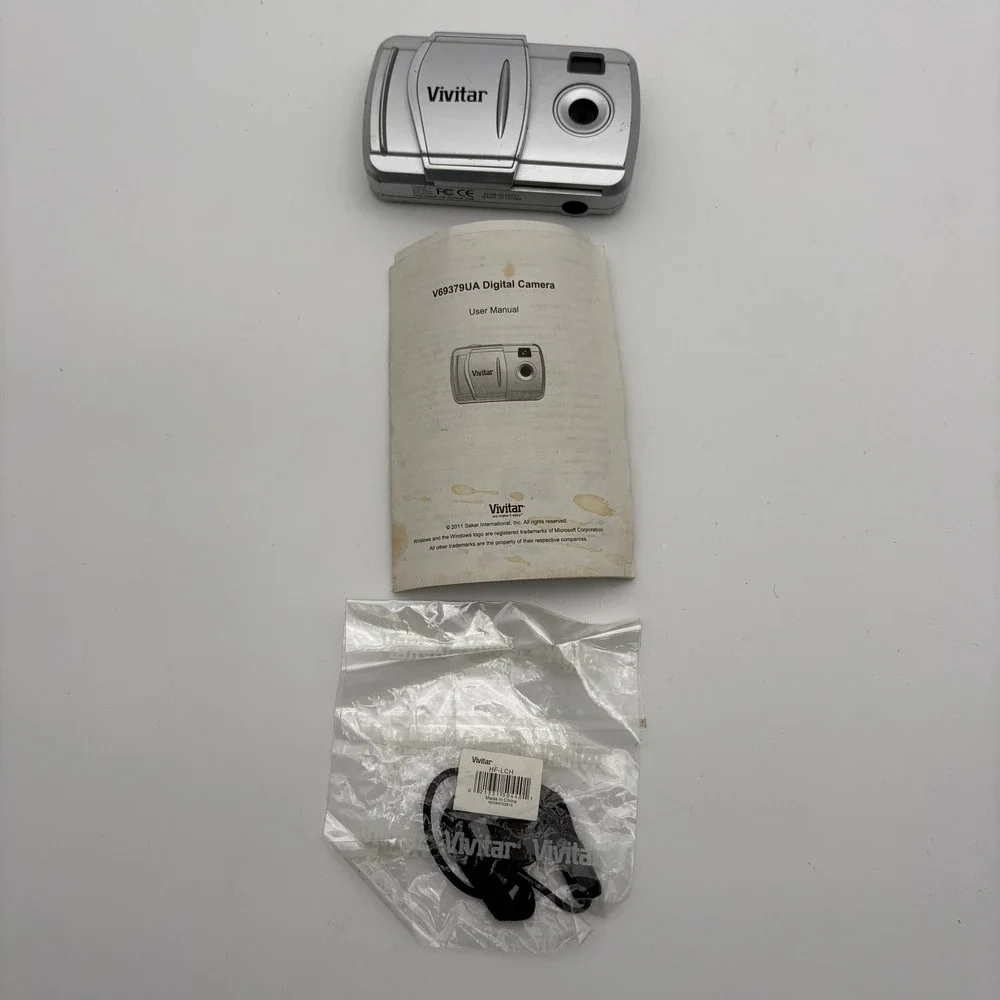 Vivitar V69379UA Digital Camera Silver Compact Point and Shoot with Manual Strap